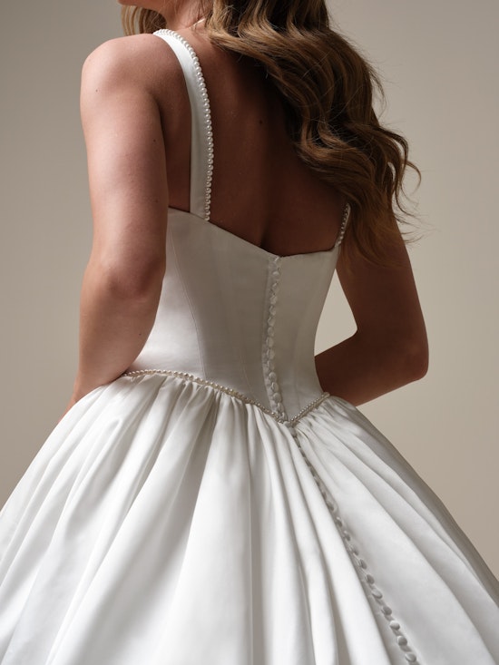 Bride wearing a wedding dress made with lower-impact fabrics called Diaz by Sottero and Midgley