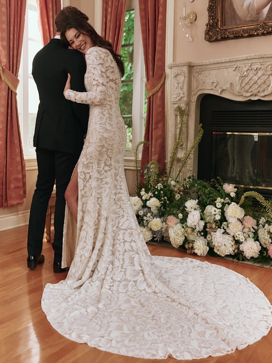 Bride wearing one of Maggie Sottero's modest wedding dresses called Holland by Sottero and Midgley