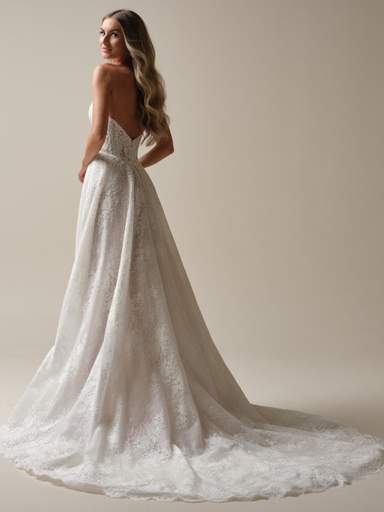 Bride wearing one of Maggie Sottero's modest wedding dresses called Narissa by Sottero and Midgley