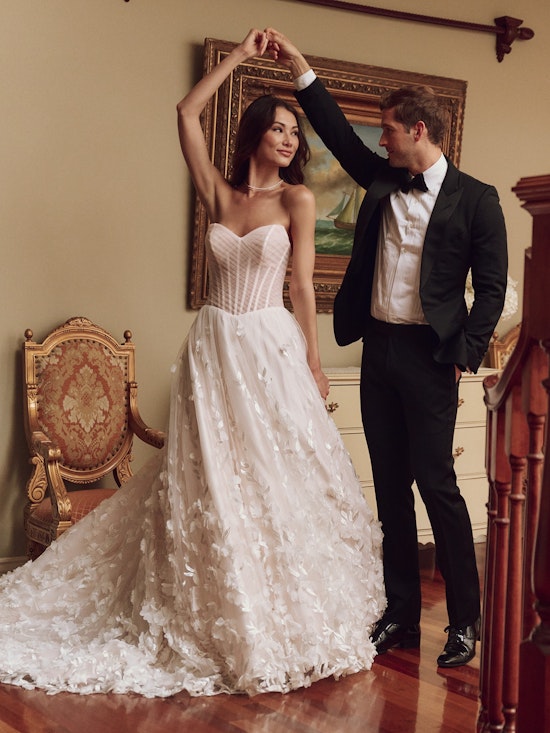 Bride wearing a wedding dress made with lower-impact fabrics called Zayn by Sottero and Midgley