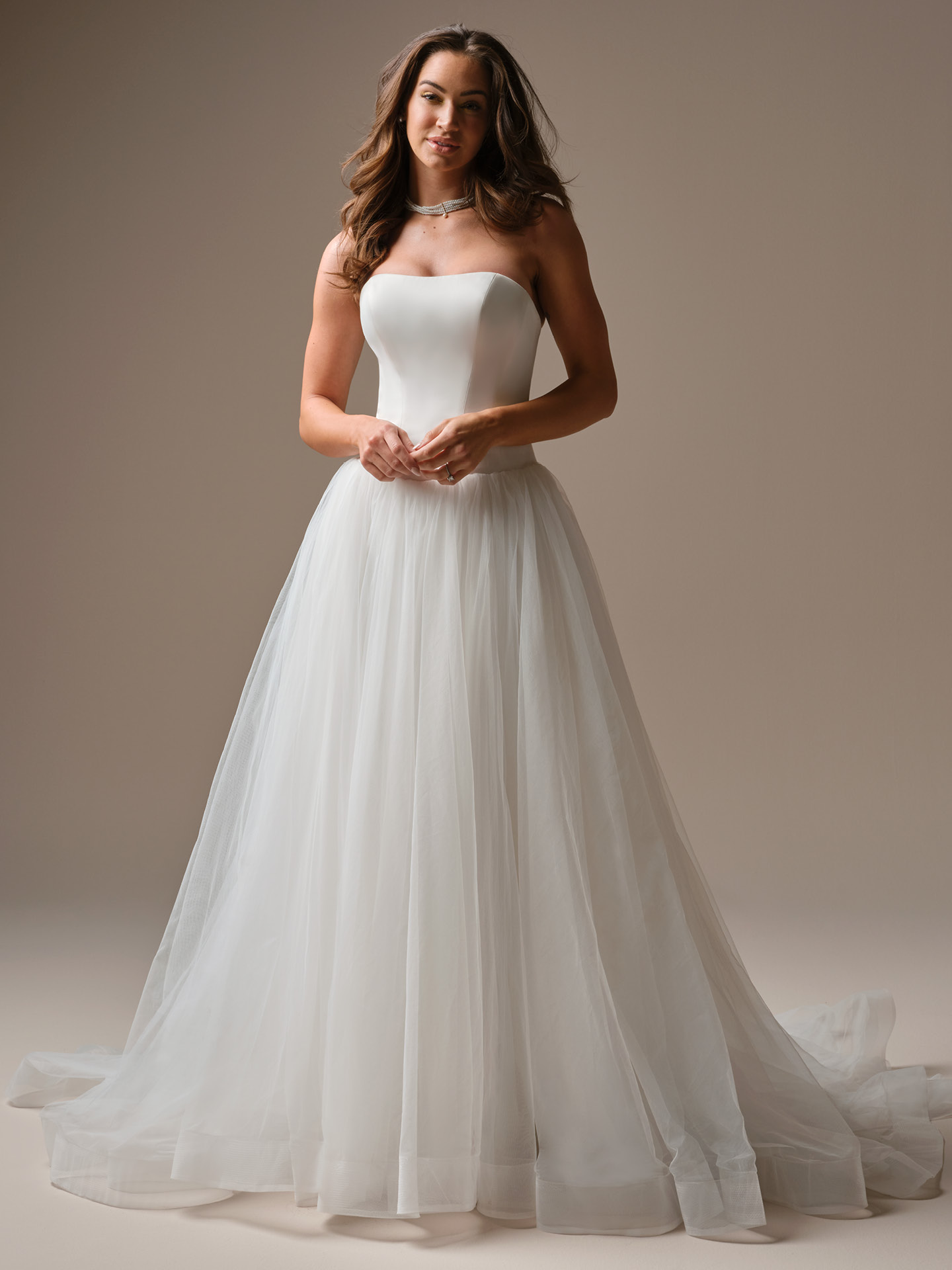 Strapless A-line wedding dress with soft scoop neckline, satin bodice, and flowing tulle skirt