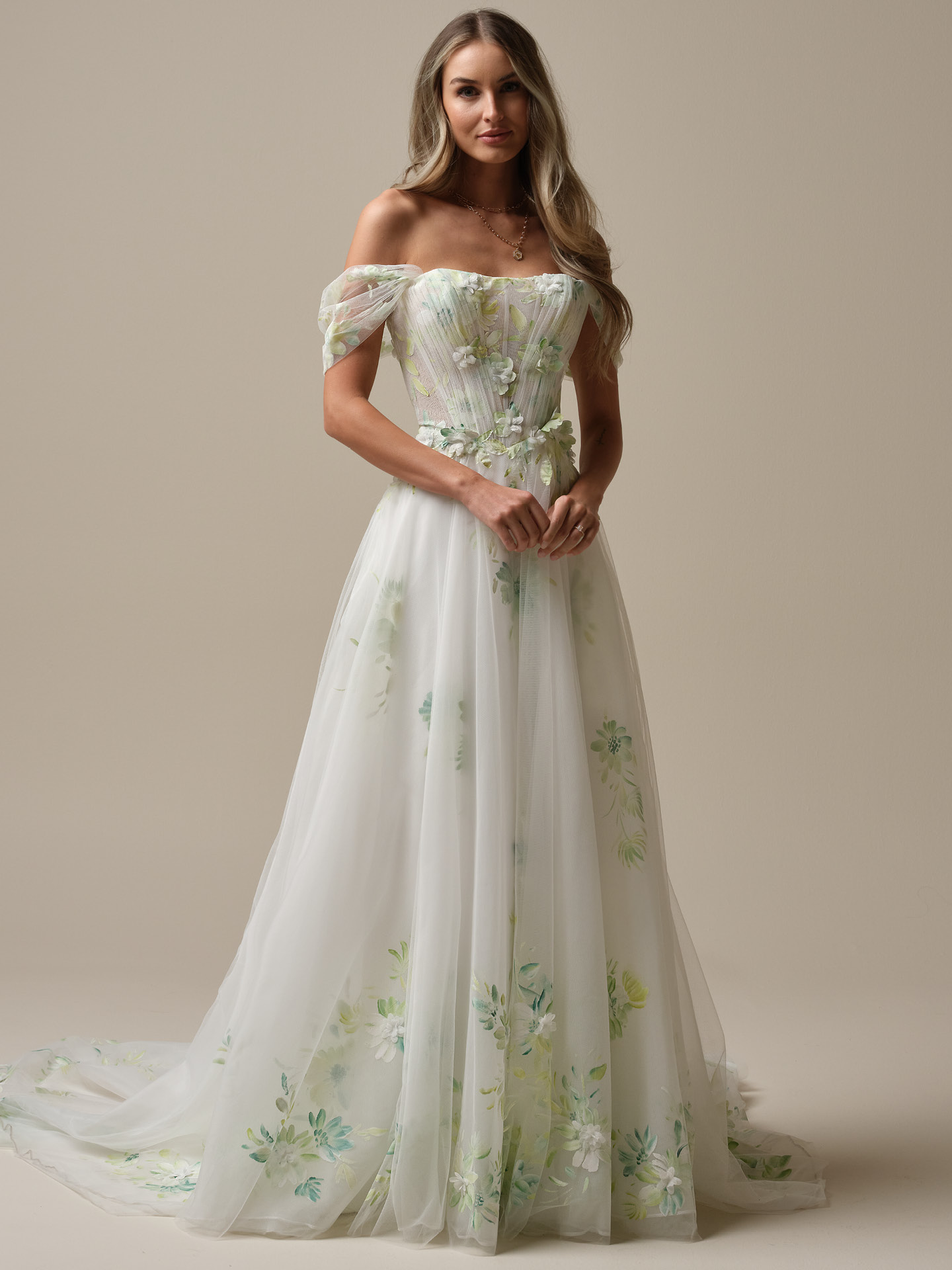 Off-the-shoulder A-line wedding dress with hand-painted floral details, tulle skirt, and flowing train
