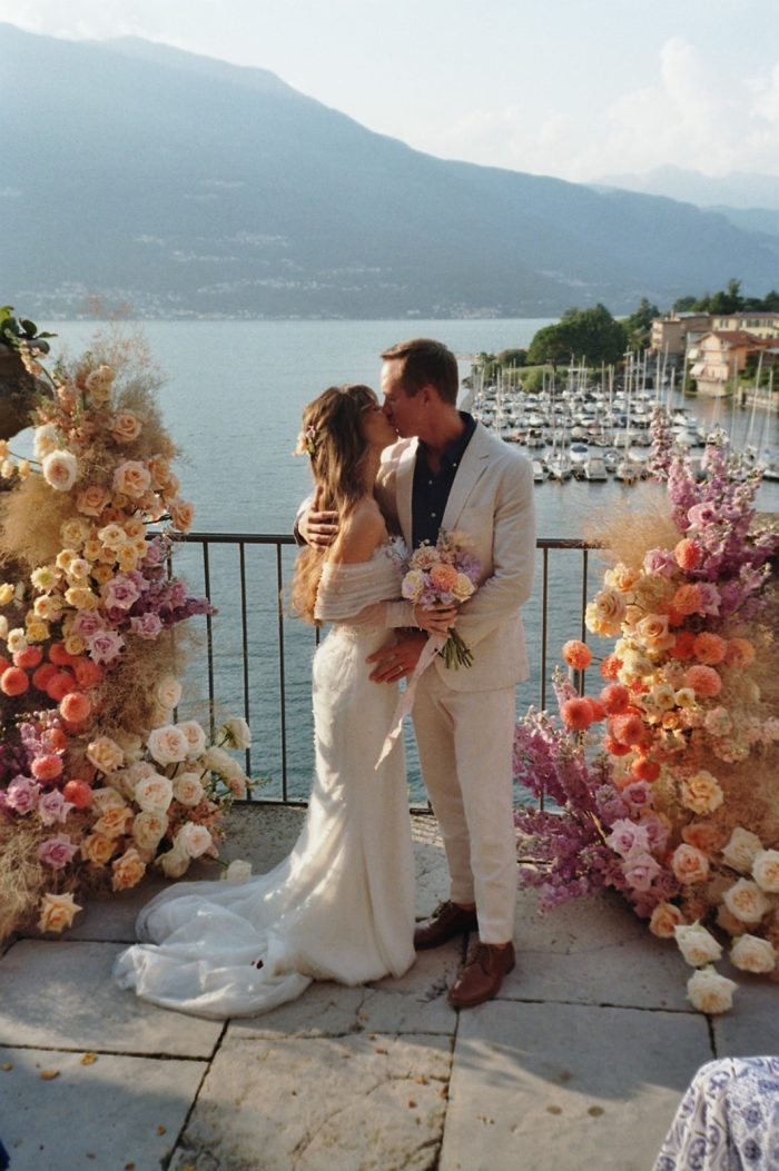 Bride wearing Drew Marie garden party wedding dress by Maggie Sottero