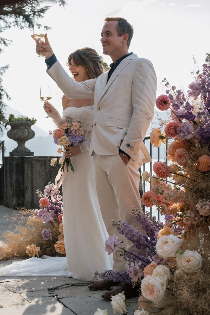 Bride wearing Drew Marie garden party wedding dress by Maggie Sottero