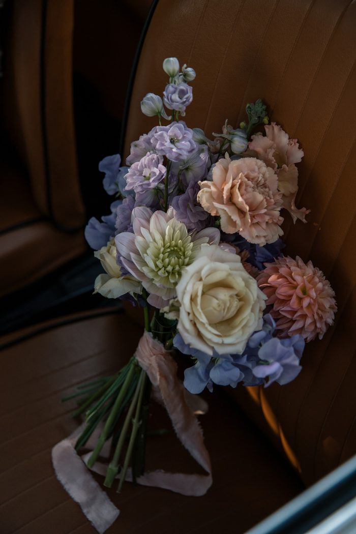 Bridal bouquet in a car
