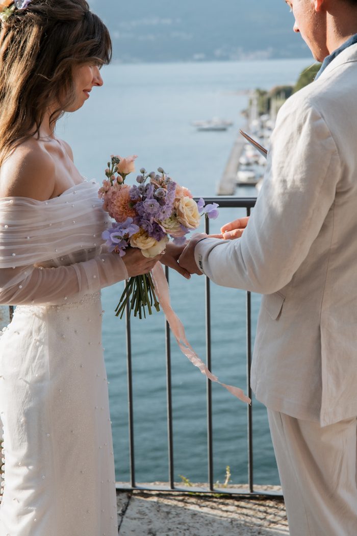 Bride wearing Drew Marie garden party wedding dress by Maggie Sottero