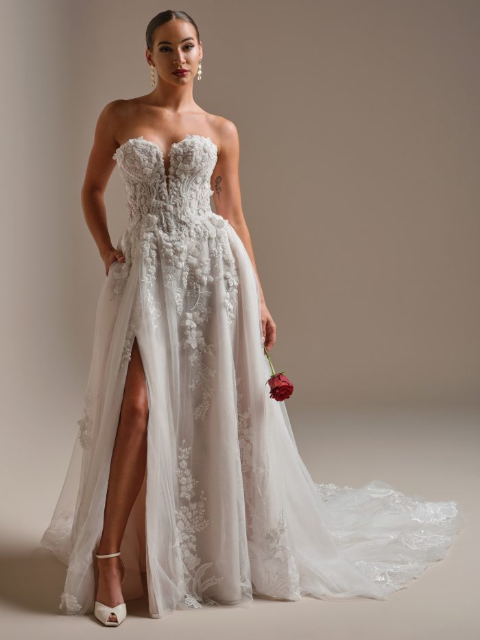 Bride wearing the Twilight Lane A-line wedding dress featuring a sweetheart neckline, 3D beaded lace appliqués, flowing tulle skirt, and a dramatic thigh-high slit for a romantic yet modern bridal look.