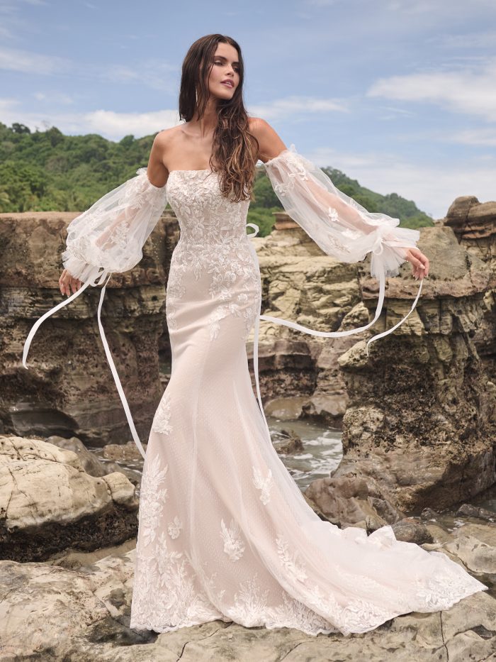 Connor by Sottero and Midgley fit-and-flare wedding dress with sequin embellished lace motifs over sparkle tulle, featuring a strapless straight neckline and sheer lace bodice