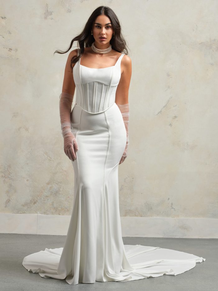 Bennett by Maggie Sottero crepe two-piece fit-and-flare wedding dress with square neckline, tank straps, and corset-style bodice.