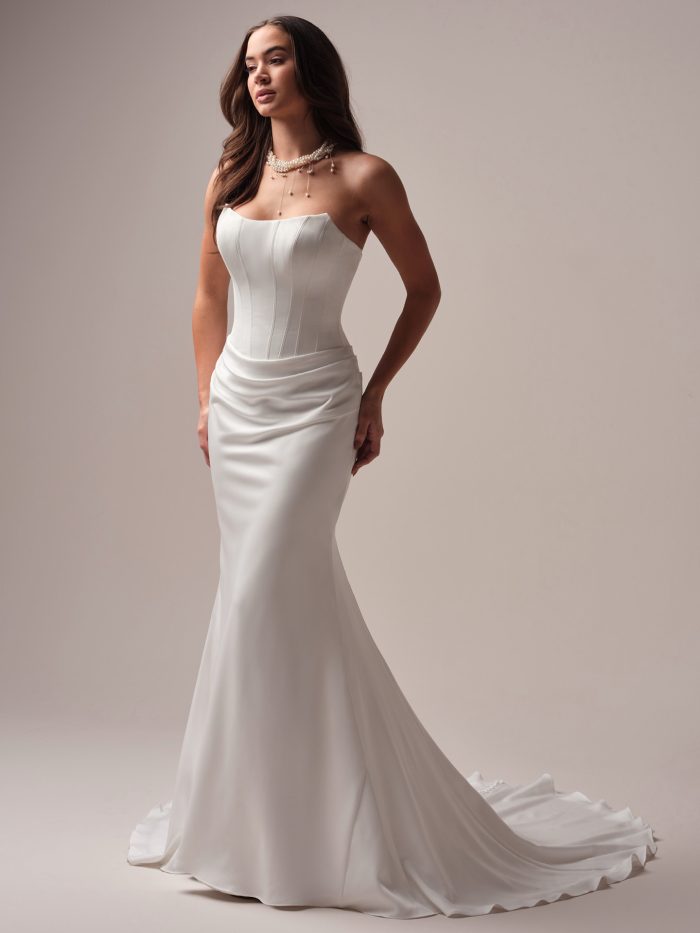 Forsythia by Sottero and Midgley minimalist satin mermaid wedding dress with ruched corset bodice and cat eye neckline.