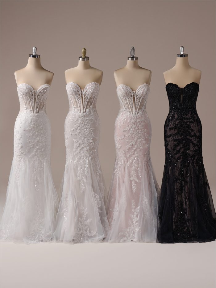 Multiple Benjie fit-and-flare wedding dresses by Maggie Sottero displayed on mannequins, featuring strapless illusion corset bodices with intricate lace appliqués and fitted silhouettes in ivory, blush, and black.