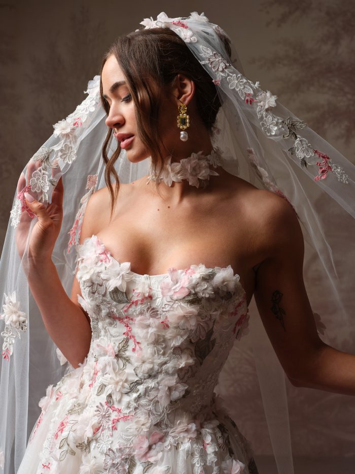 Maggie Sottero Benton cathedral veil and ballgown bodice detail with 3D flowers and pink embroidery