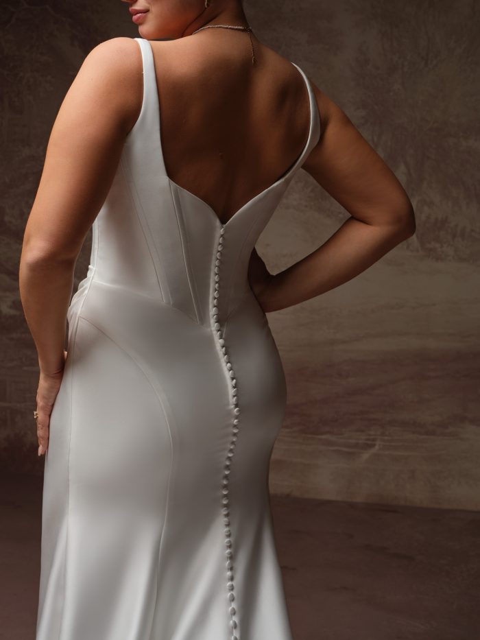 Rebecca Ingram Pamela fit-and-flare wedding dress back view with V-back neckline and covered buttons