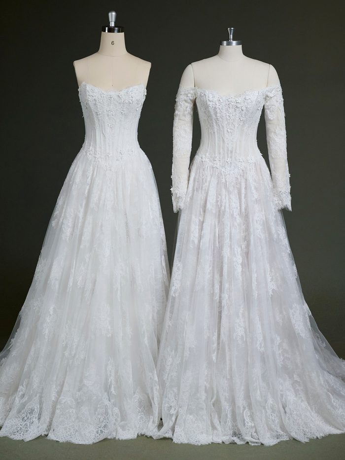 Two versions of the Kitaro by Maggie Sottero wedding gown are displayed side by side on dress forms. Both feature a romantic lace ballgown silhouette with a corset-inspired bodice, floral lace appliqués, and a full tulle skirt. The gown on the left is shown strapless with a sweetheart neckline, while the gown on the right includes detachable off-the-shoulder long lace sleeves for added coverage and versatility.