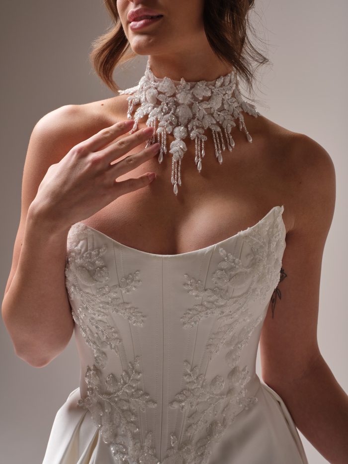 Amadora strapless wedding dress bodice by Sottero and Midgley with beaded embellishments and structured corset.
