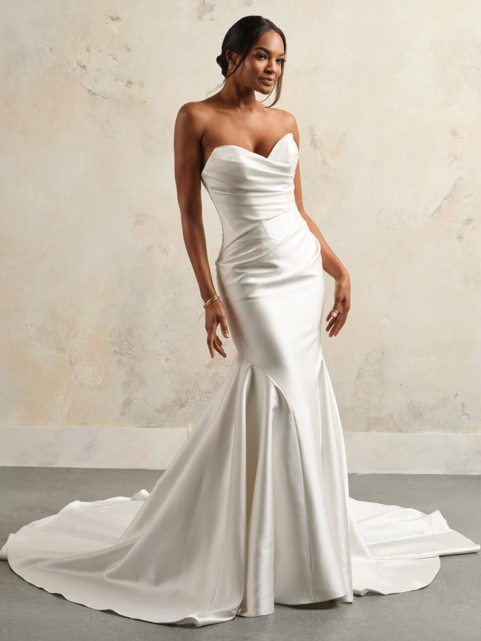 Sottero and Midgley Giselle satin fit-and-flare wedding dress with sweetheart neckline and flowing train