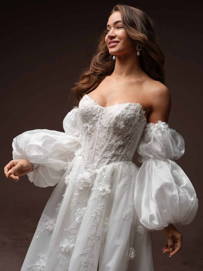 Fern detached sleeves by Maggie Sottero featuring voluminous puff sleeves with floral lace appliqués.