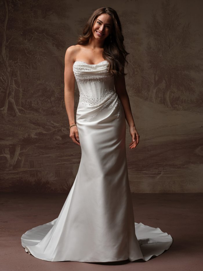Melissa Royale by Maggie Sottero fit-and-flare wedding dress featuring a pearl-beaded corset bodice, draped satin skirt, and chapel train.